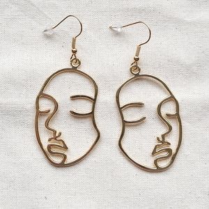 Gold Toned Picasso Face Earrings | Drop Style